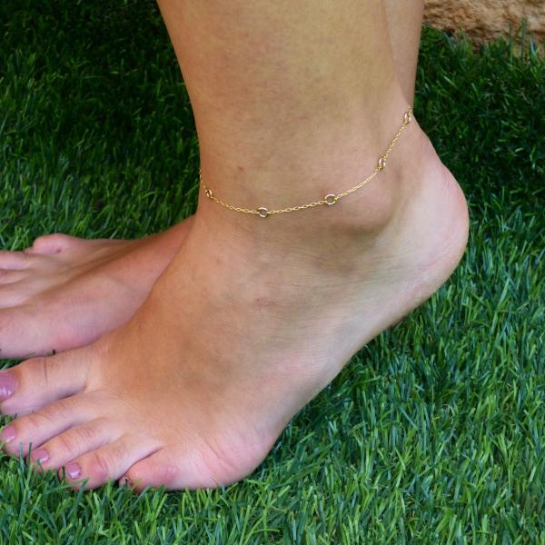 A woman is wearing an Ankle bracelet with tiny circles-AlinMay